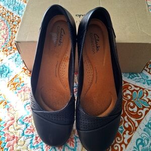 Clarks Black Flats & Loafers with Soft Material and Rounded Toe
